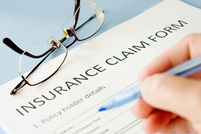 how to file an insurance claim for medical bills while traveling
